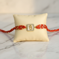 Om Rakhi - Closer Match